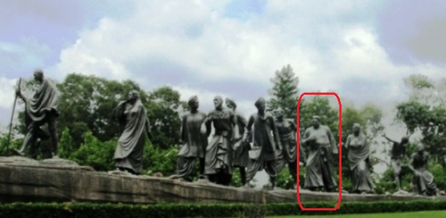 "Gyarah Murti” or "Eleven Statues with the priest highlighted in Red. 